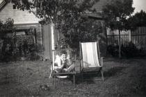 Harry Fink relaxing in a garden
