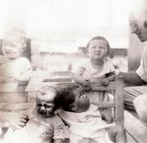 Asaf Auerbach among children from the kibbutz